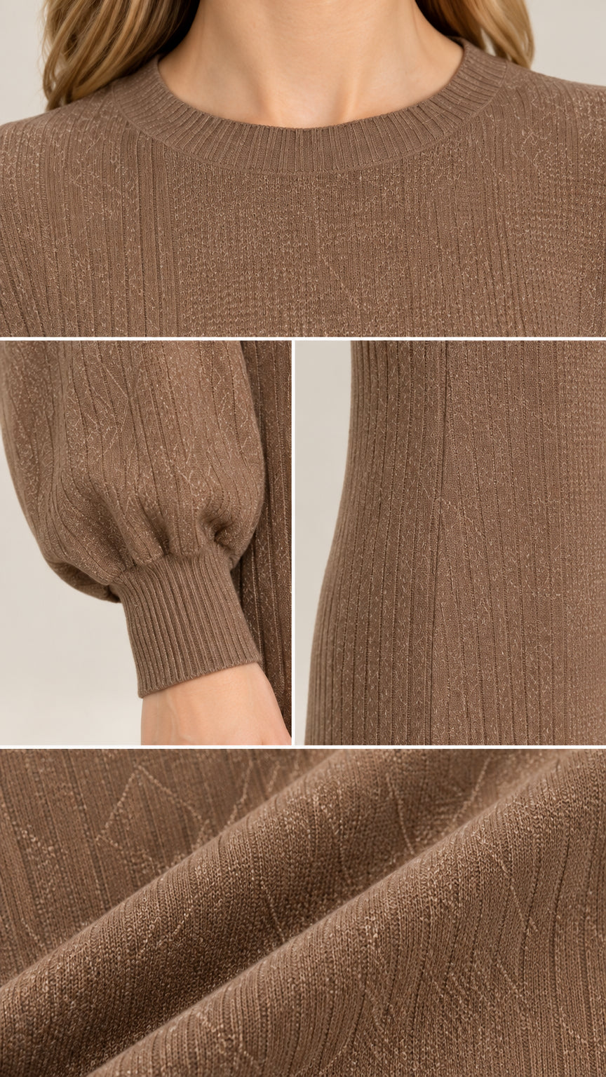 Close-up details of ribbed neckline, gathered sleeve cuff, and textured knit fabric
