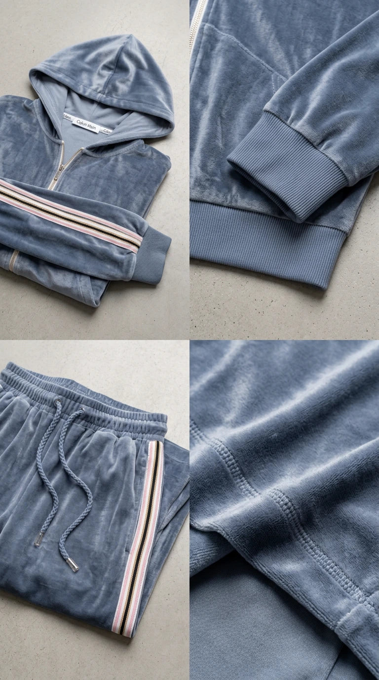 Close-up details of dusty blue velour fabric, ribbed cuffs, drawstring waistband, and hood