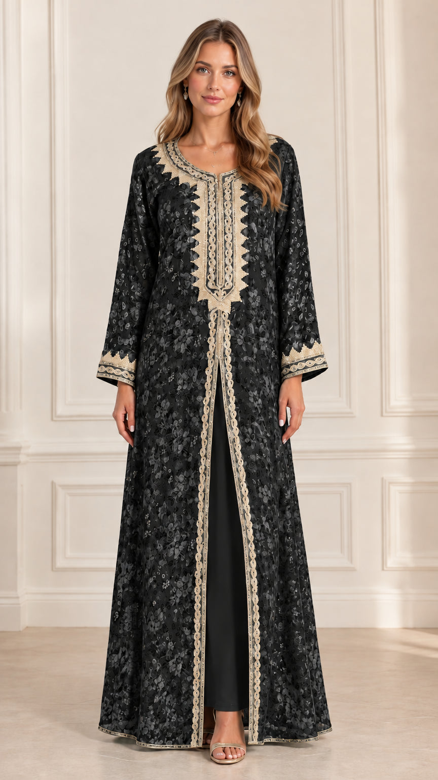 Front view of woman wearing black floral jacquard embroidered layered kaftan dress