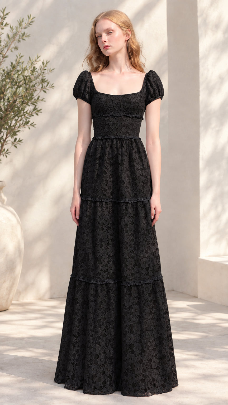 Front view of black floral lace tiered puff sleeve maxi dress
