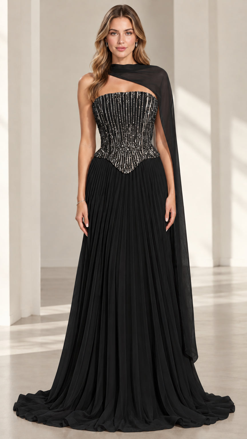Black strapless beaded corset evening gown with pleated chiffon maxi skirt