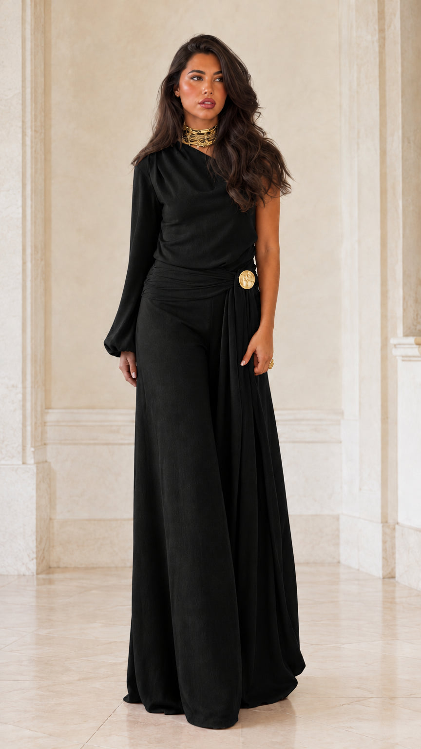 Full-length studio shot of black one-shoulder wide-leg evening jumpsuit