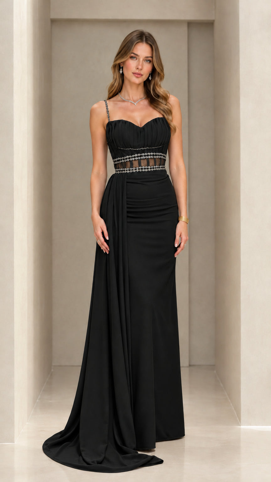 Front view of black sweetheart maxi evening gown with sheer beaded waistband