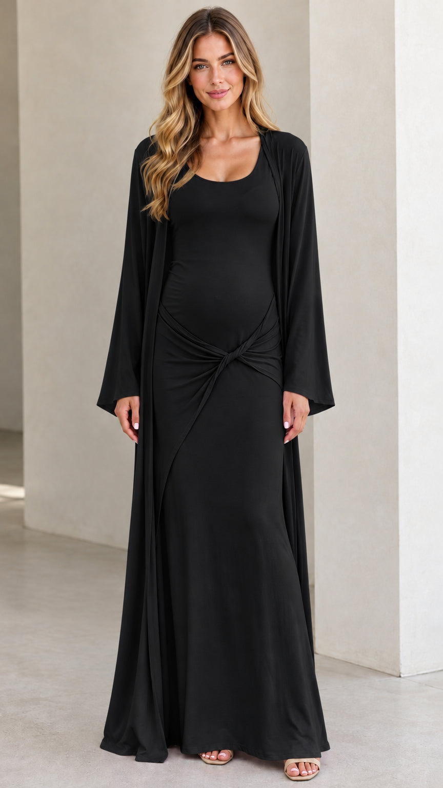 Front view of pregnant model wearing Black maternity maxi dress and cardigan set