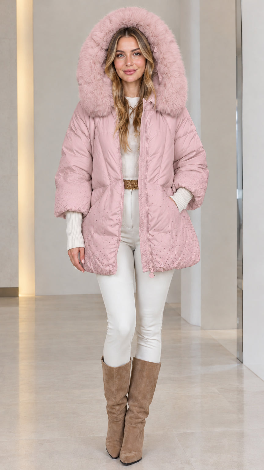 Front view of woman wearing blush pink faux fur hooded puffer jacket