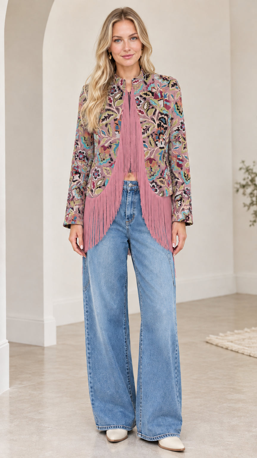 Model wearing dusty pink and mauve floral jacquard fringe jacket