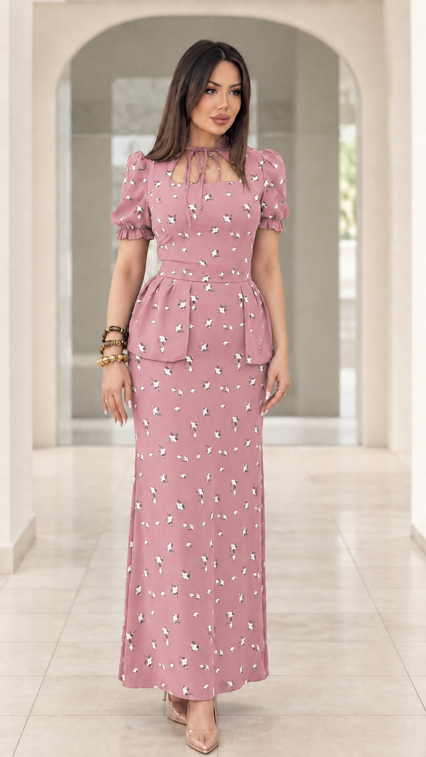 Model wearing dusty pink floral print peplum puff sleeve maxi dress