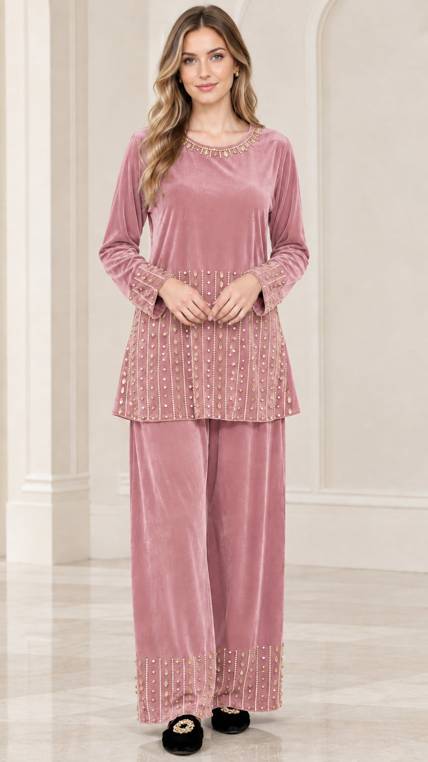 Front view of woman wearing dusty rose pink embellished velvet tunic and pants set