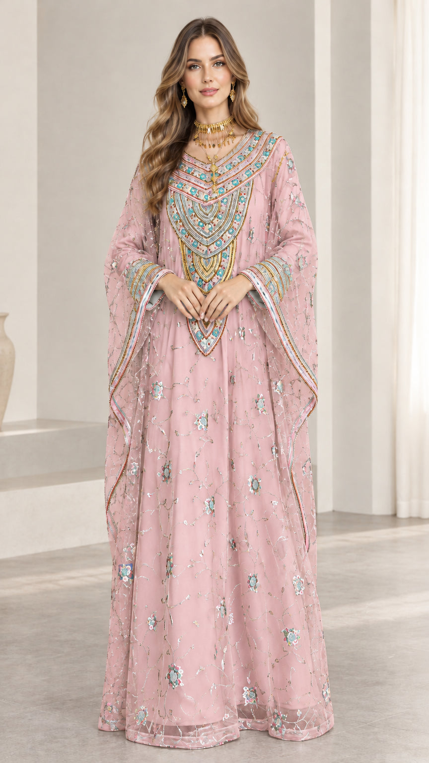 Front full-length view of woman wearing dusty pink embroidered kaftan maxi dress