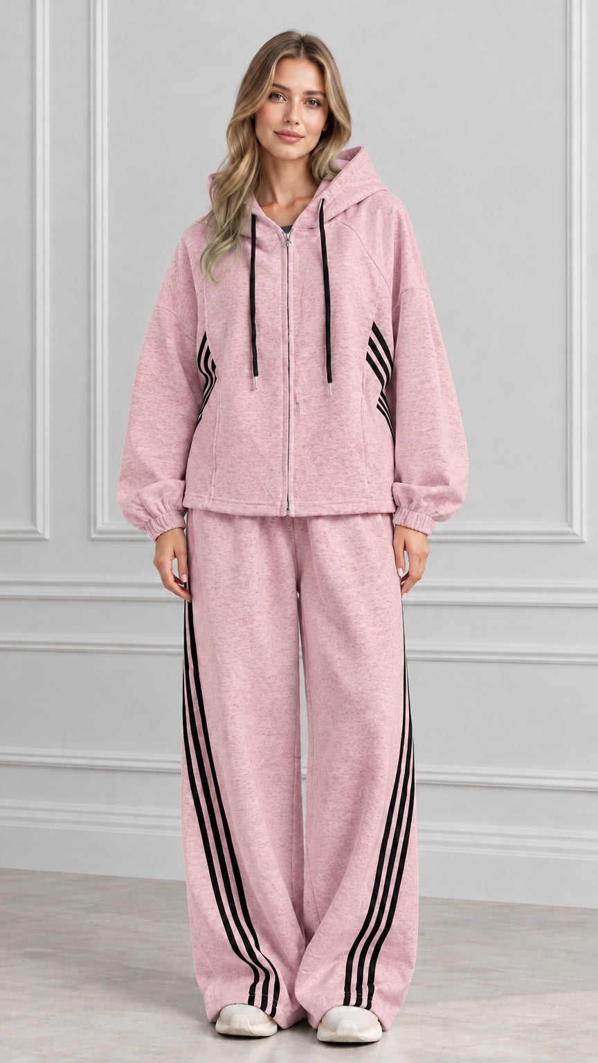Front view of woman wearing Dusty Pink zip-up hoodie and wide-leg striped sweatpants set