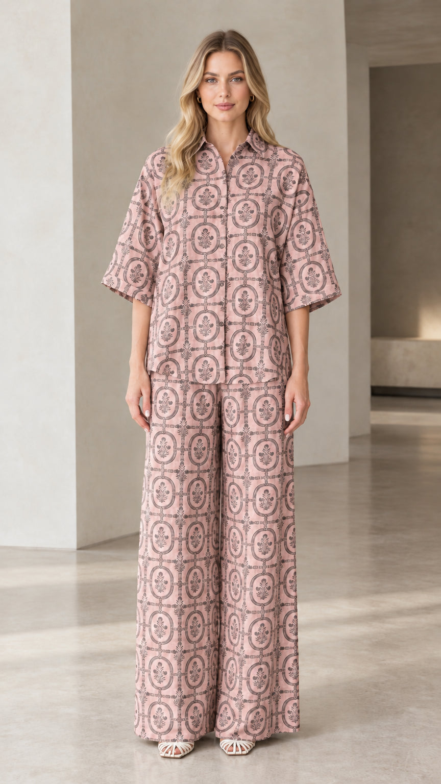 Full front view of woman wearing dusty pink vintage medallion print two-piece matching set