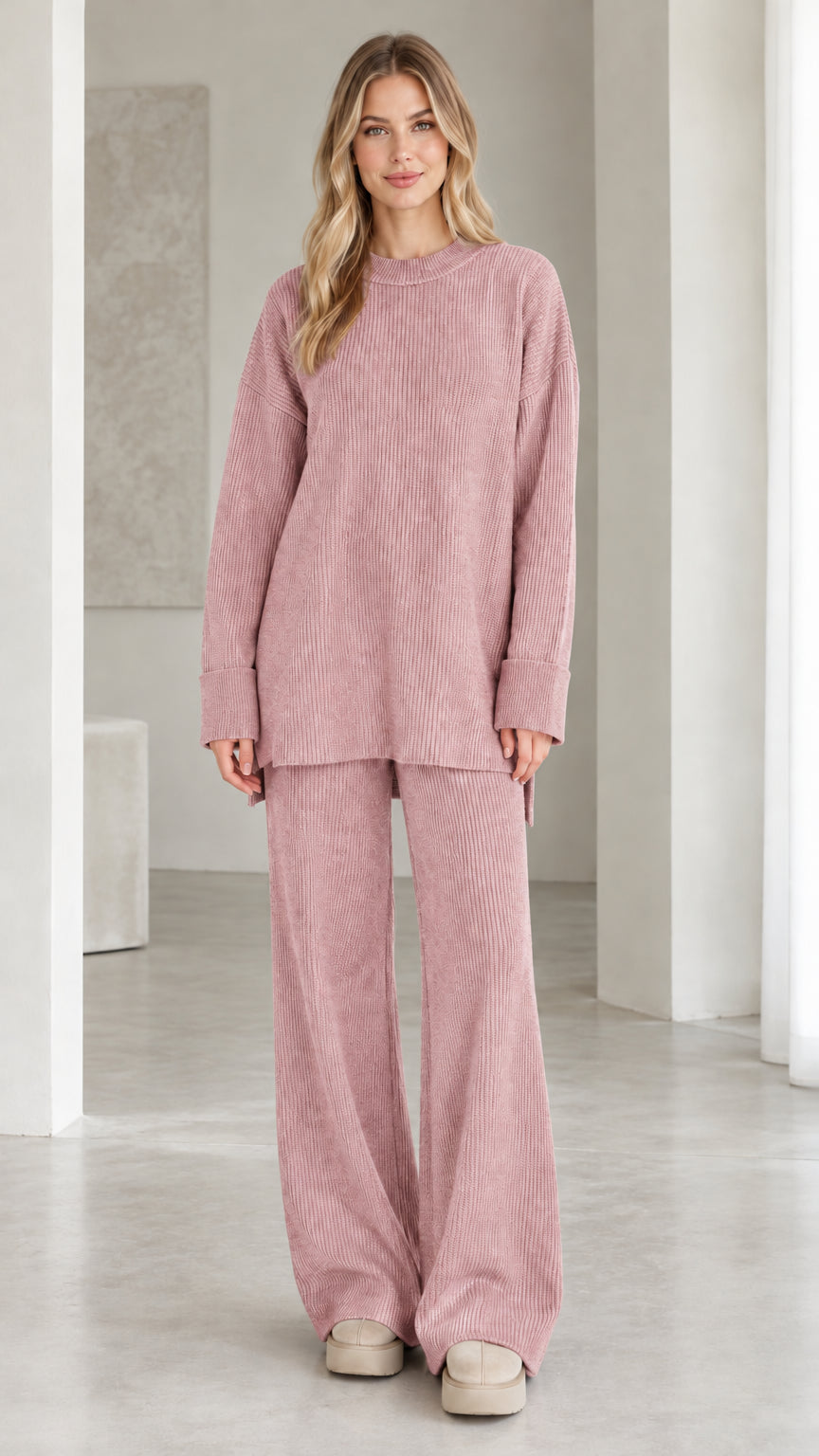 Model wearing dusty pink ribbed knit two-piece lounge set