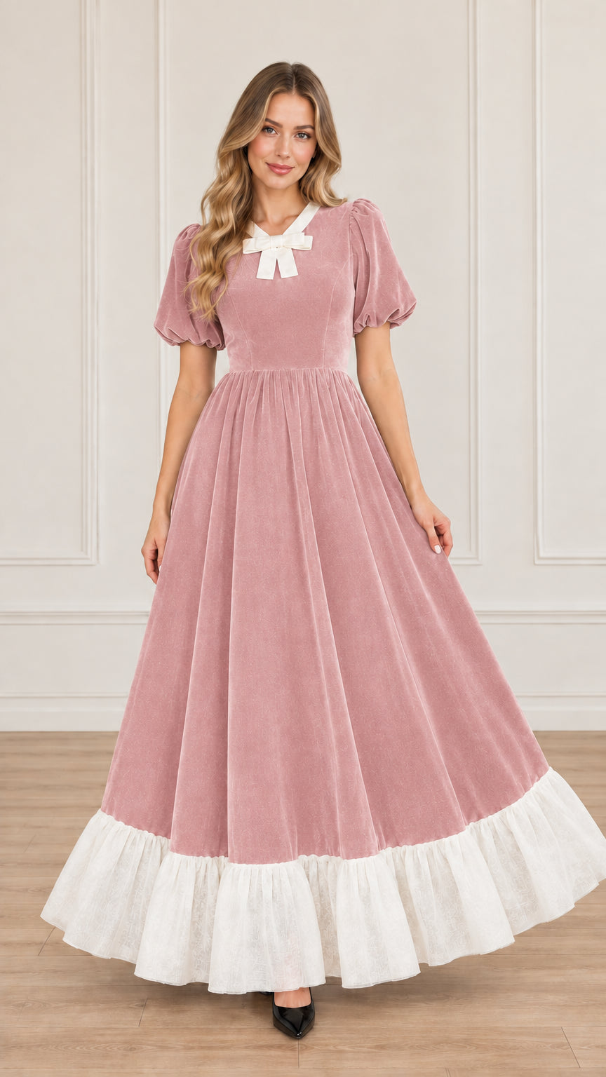 Front view of dusty pink velvet maxi dress with contrast white bow collar and hem
