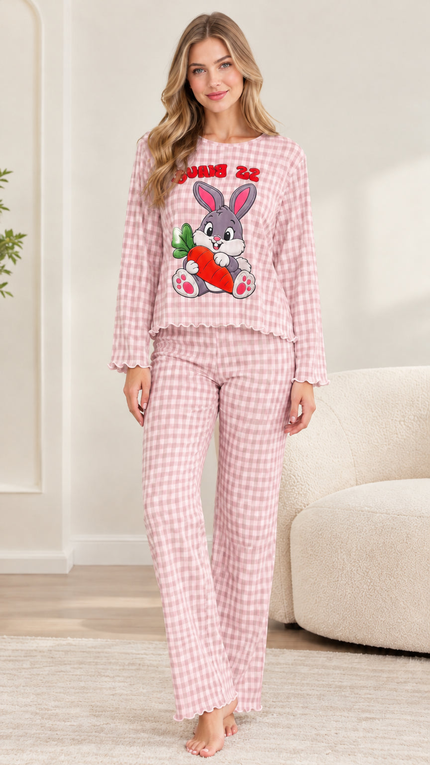 Front view of woman wearing pink gingham bunny pajama set