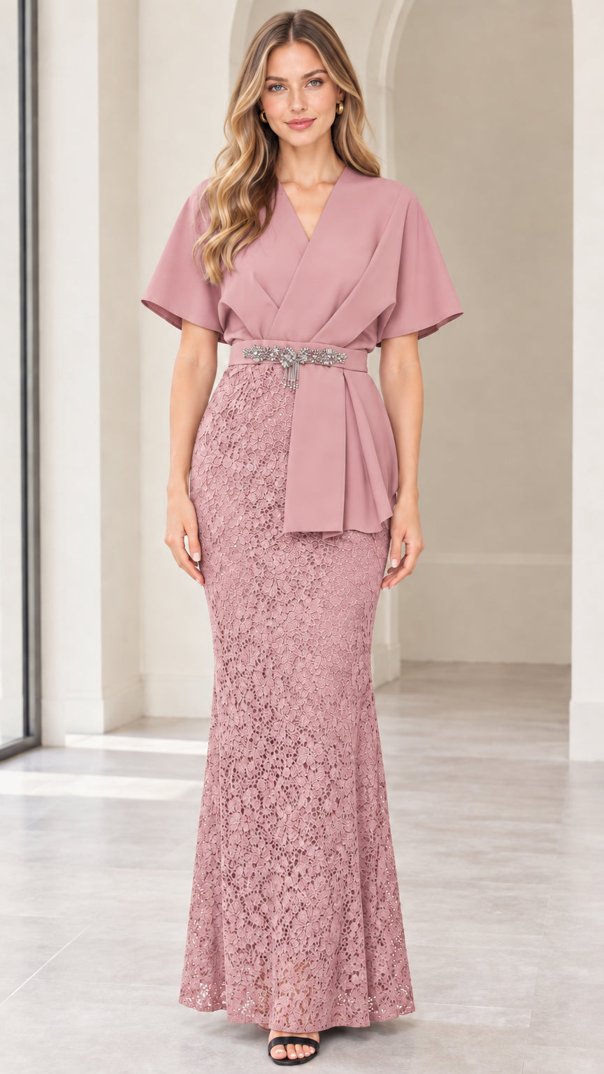 Front full-length view of model wearing dusty rose flutter sleeve lace maxi dress