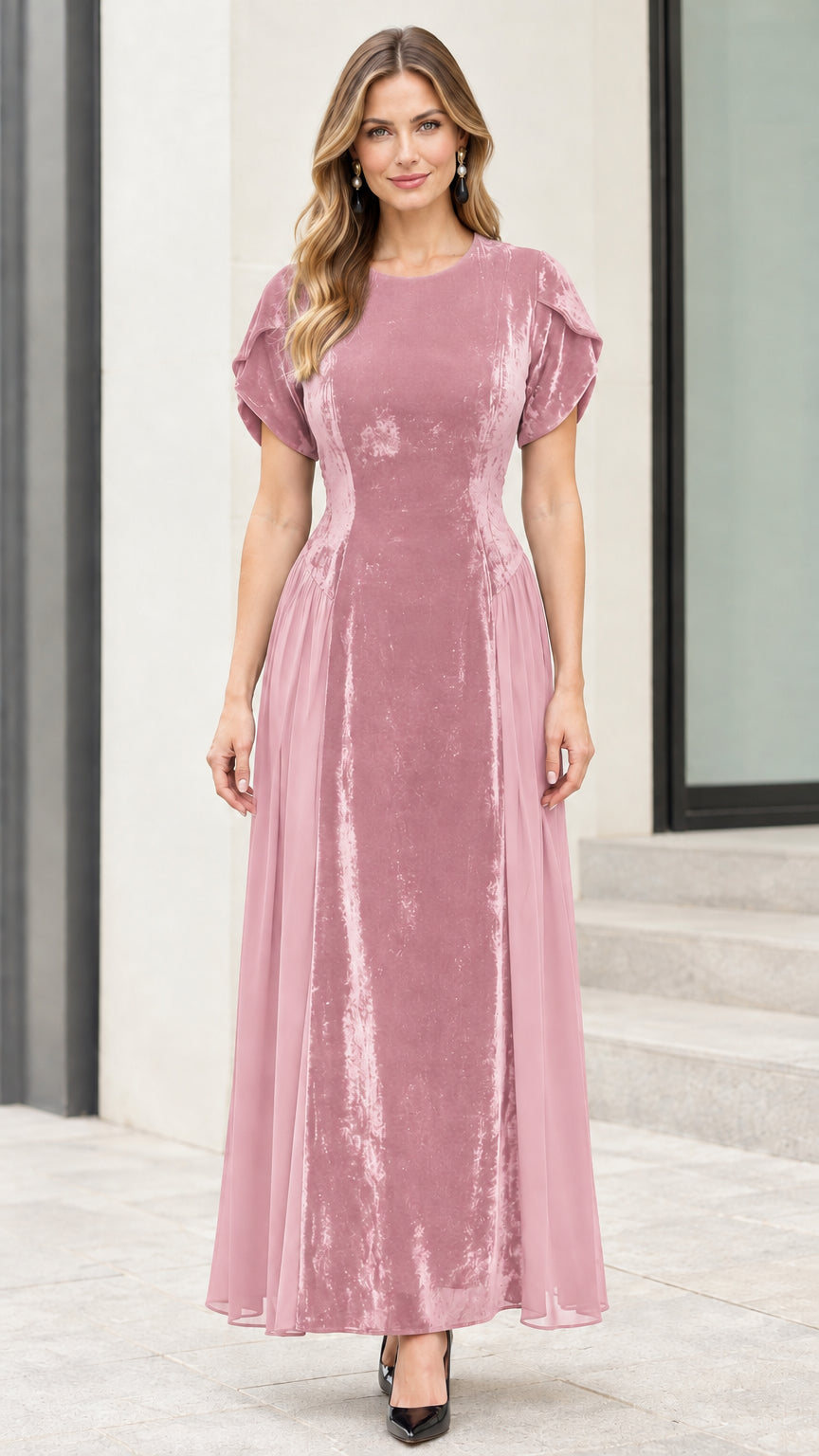 Front view of model wearing dusty rose pink velvet tulip sleeve maxi dress