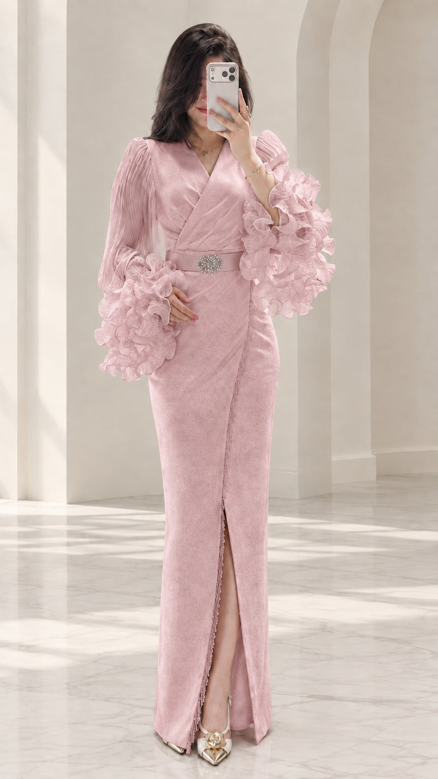 Dusty pink long sleeve evening gown with tiered ruffle cuffs and crystal belt brooch