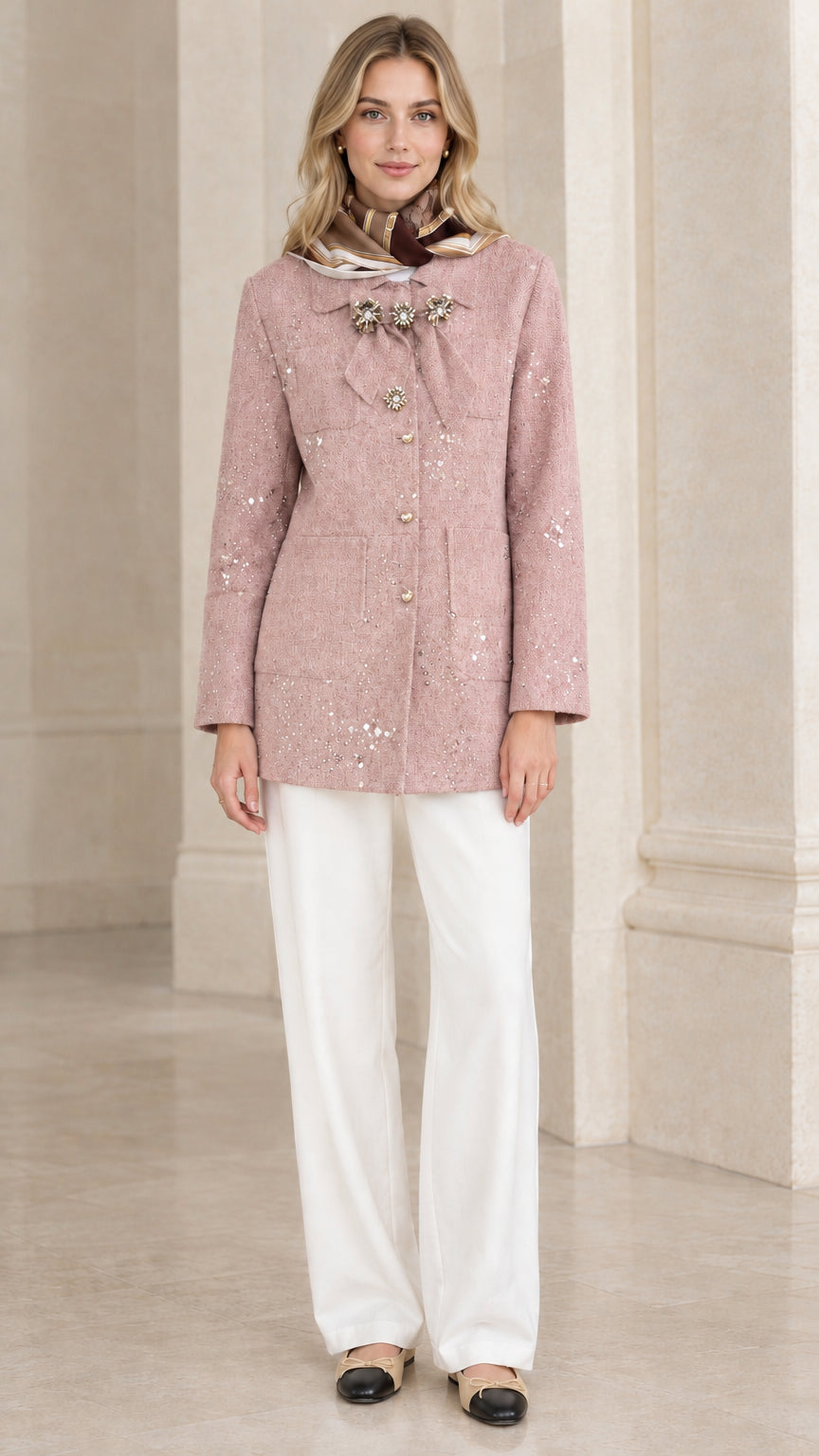 Full front view of model wearing dusty pink sequin embellished tweed jacket