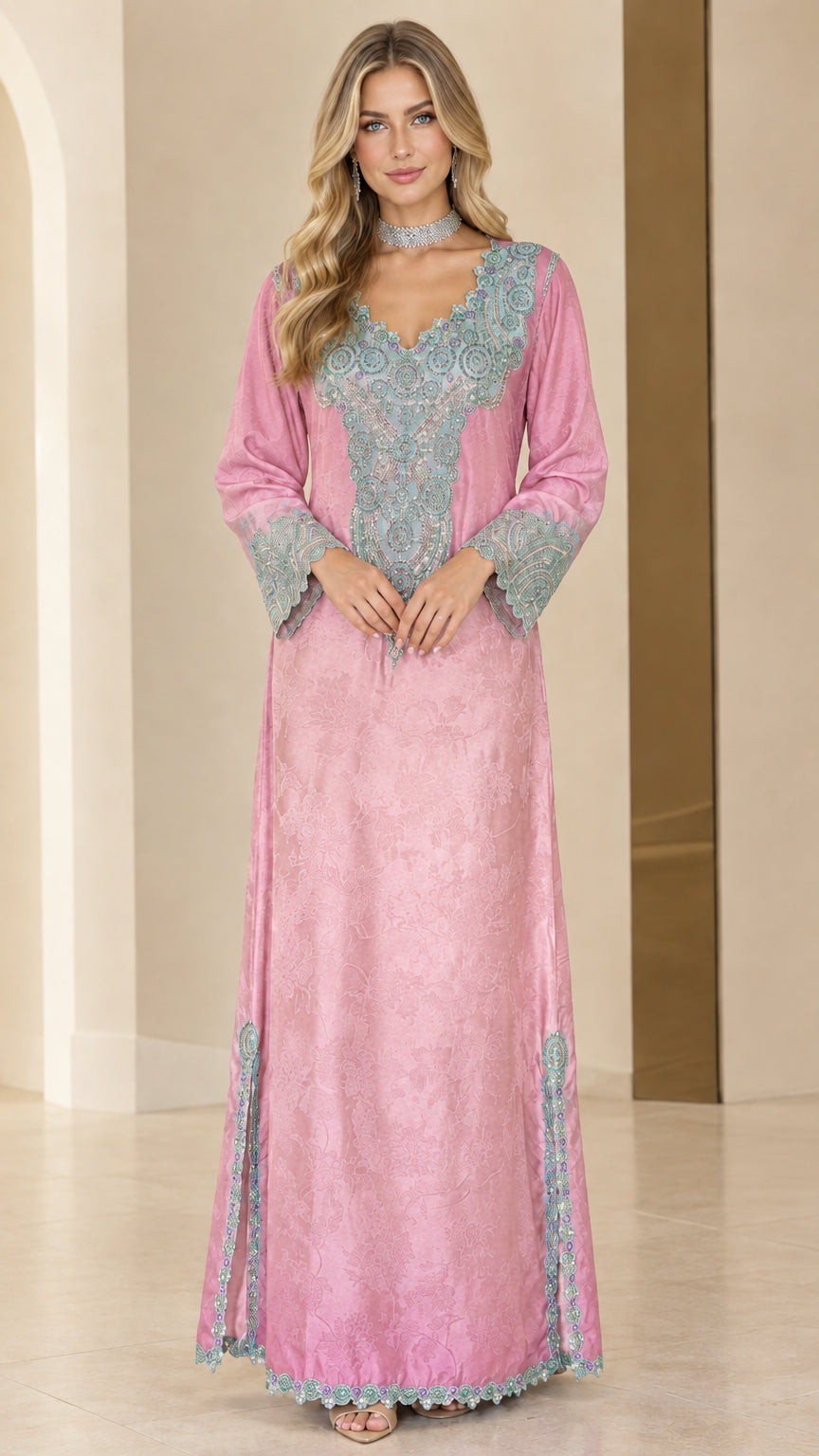 Front full-length view of woman in soft pink embroidered kaftan maxi dress