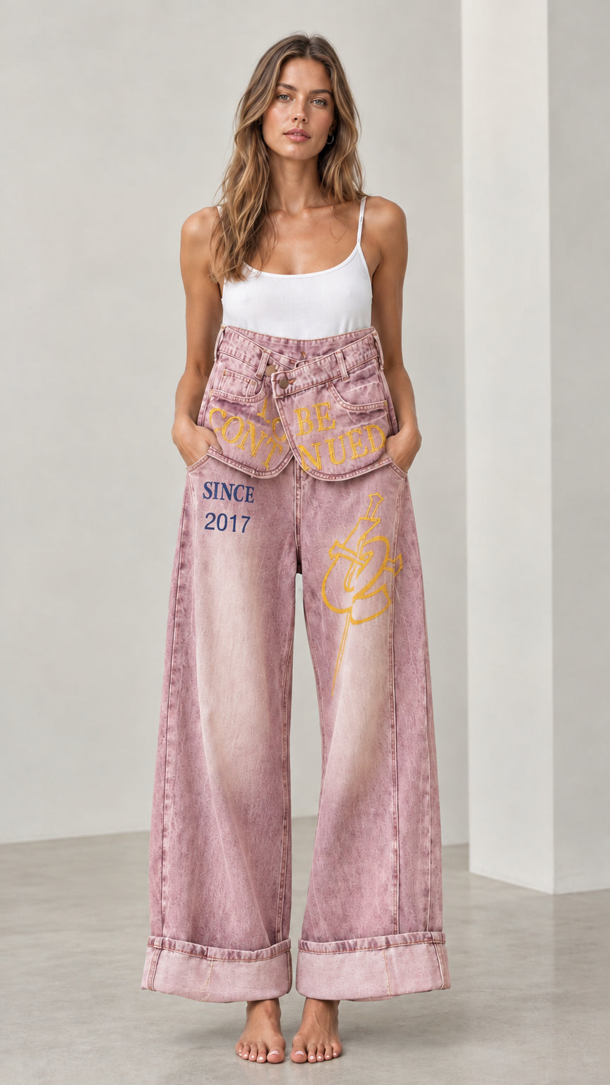 Front full view of Dusty Pink Fold-Over Waist Graphic Wide-Leg Jeans