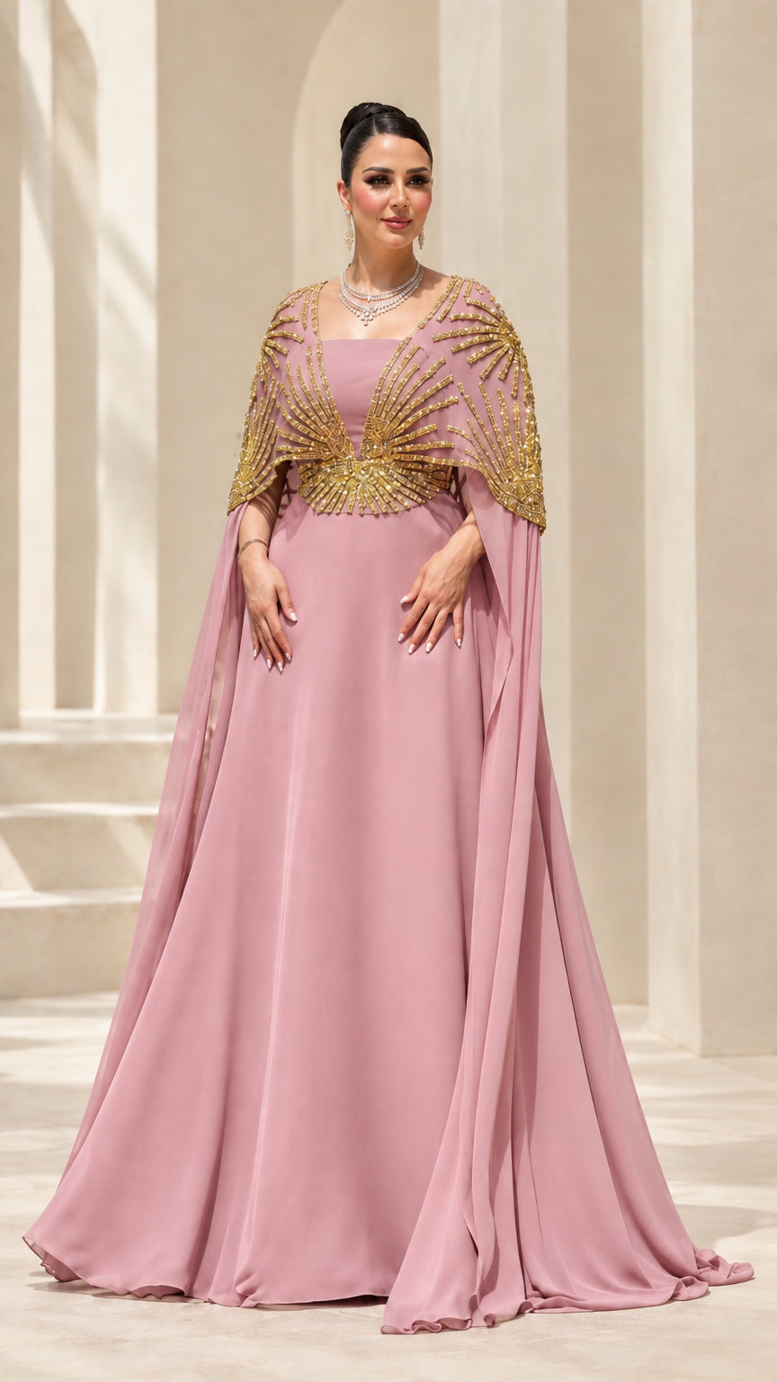 Dusty pink floor-length evening dress with gold embellished capelet