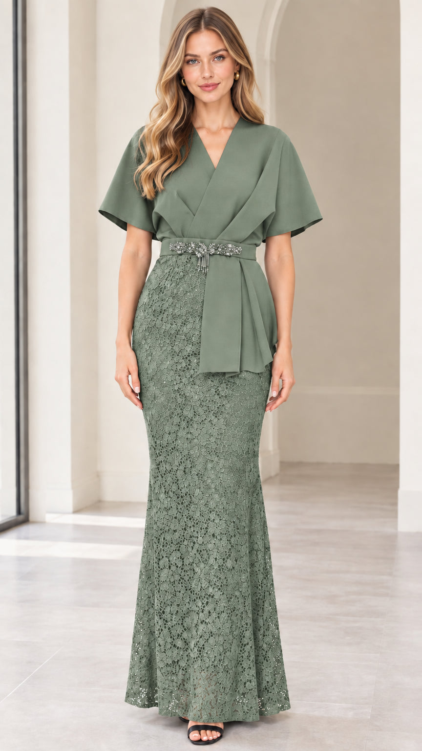 Front full-length view of model wearing sage green flutter sleeve lace maxi dress