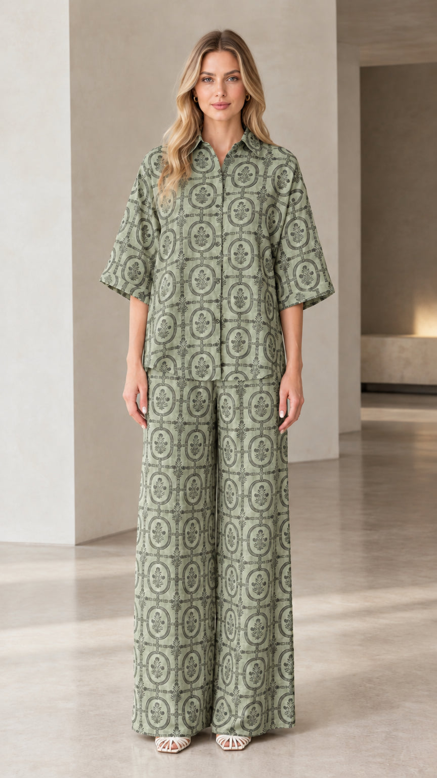 Full front view of woman wearing sage green vintage medallion print two-piece matching set