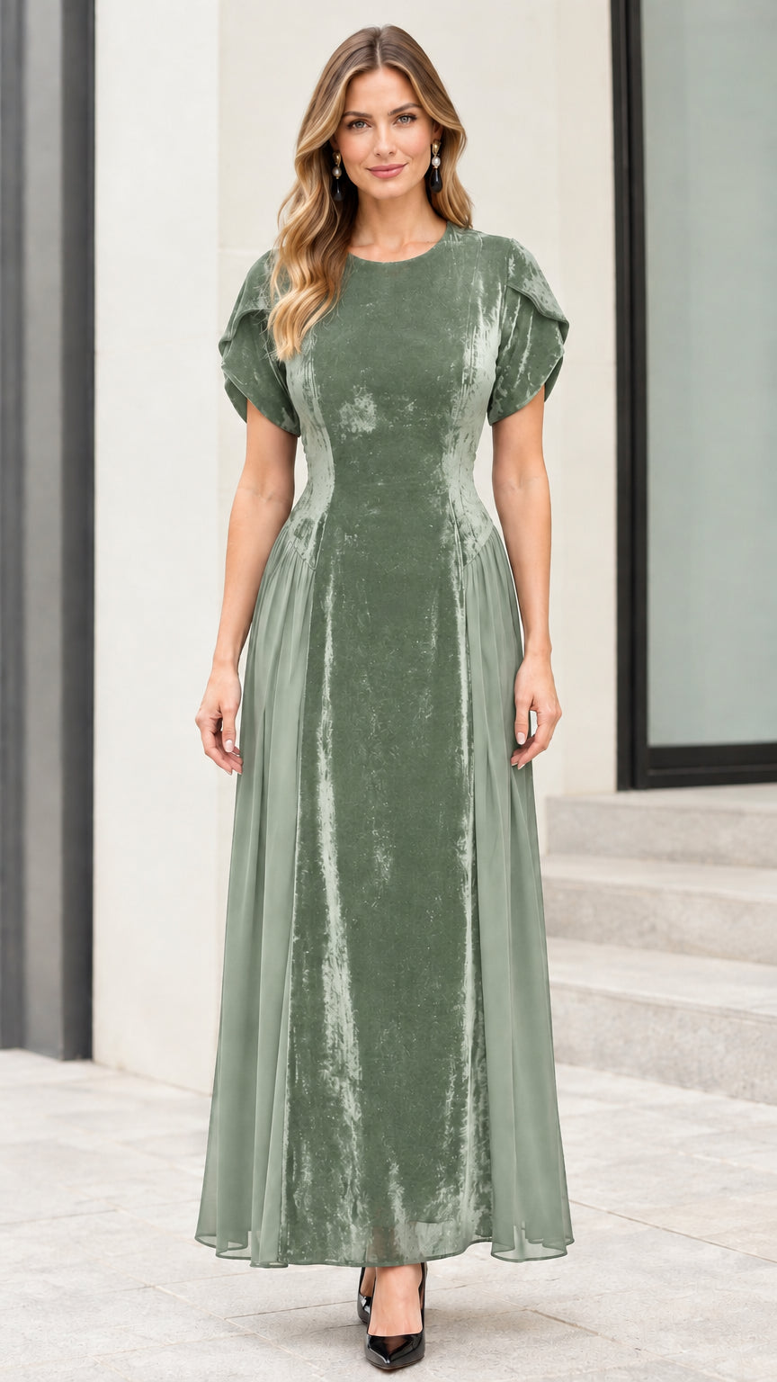 Front view of model wearing sage green velvet tulip sleeve maxi dress