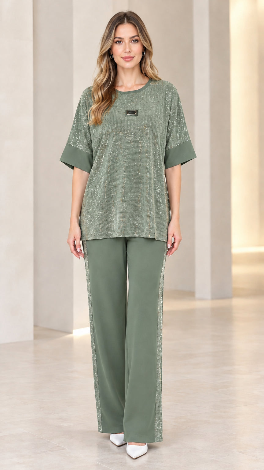 Full-length view of model wearing sage green metallic knit two-piece pant set