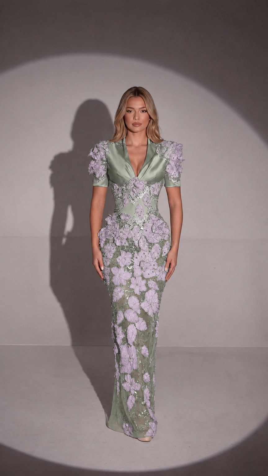 Front view of sage green 3D floral appliqué embellished evening gown