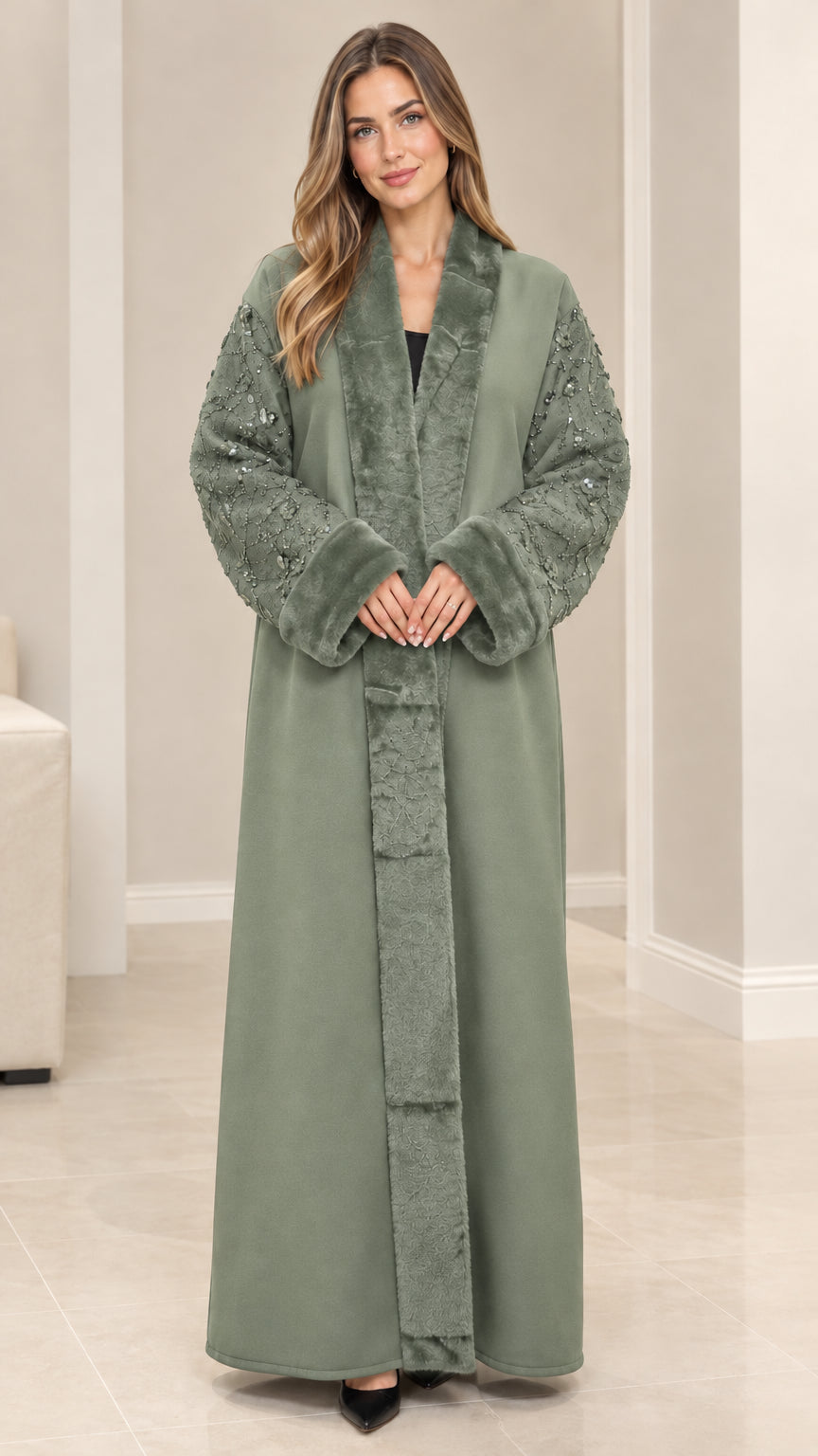 Front view of model wearing sage green faux fur trim sequin abaya coat