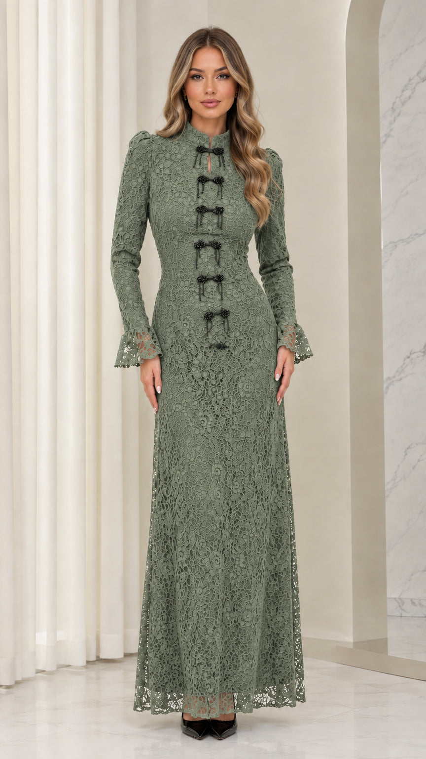 Front full view of woman wearing sage green floral lace long-sleeve maxi dress