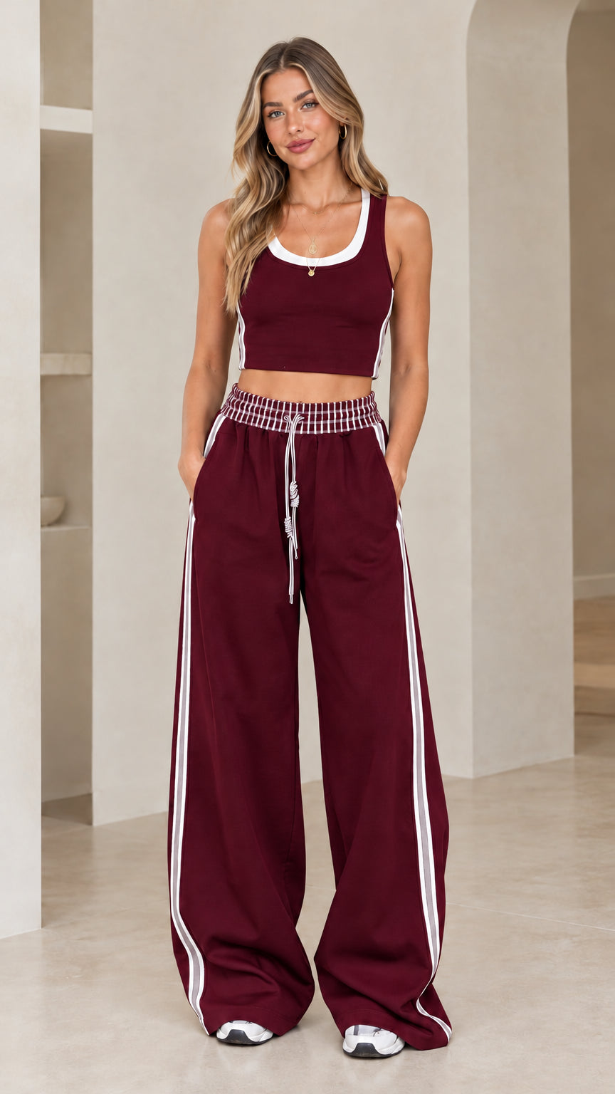Front view of model wearing Burgundy crop tank and wide-leg pants set