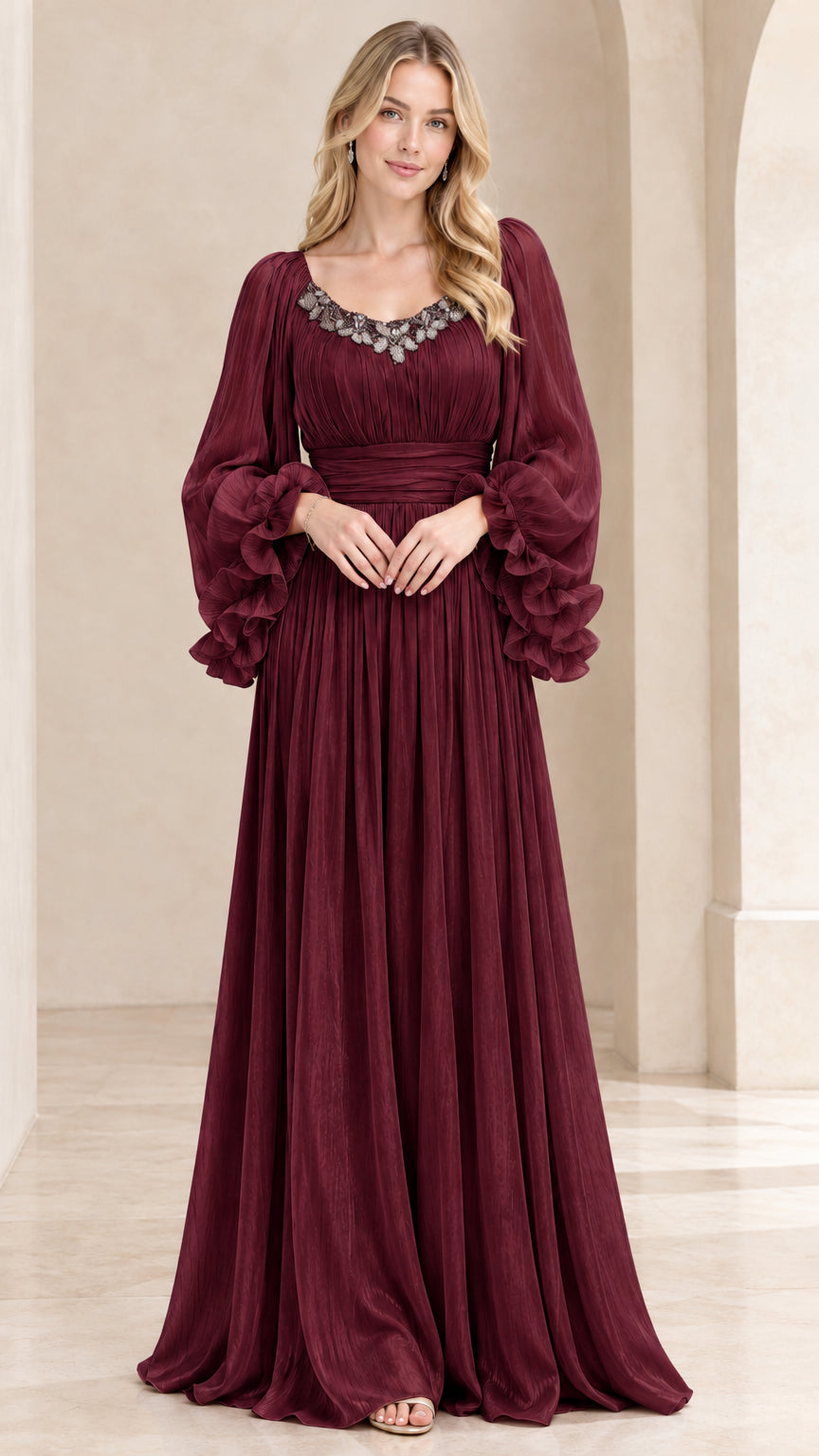 Front view of model wearing Burgundy wine pleated evening gown with ruffle puff sleeves