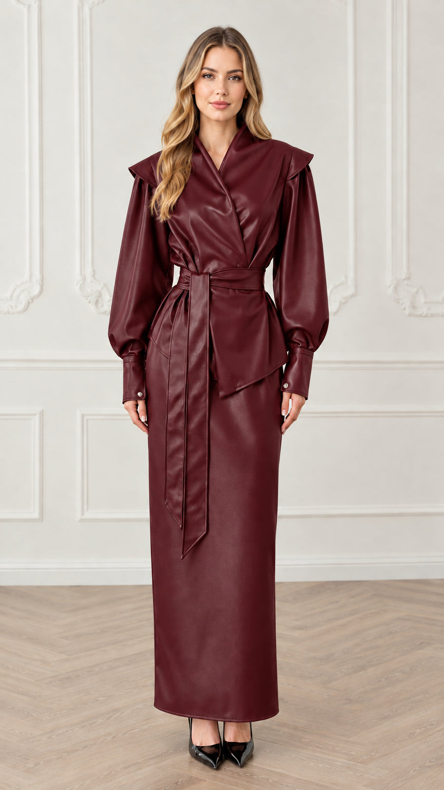 Model wearing burgundy wine faux leather wrap top and maxi skirt set