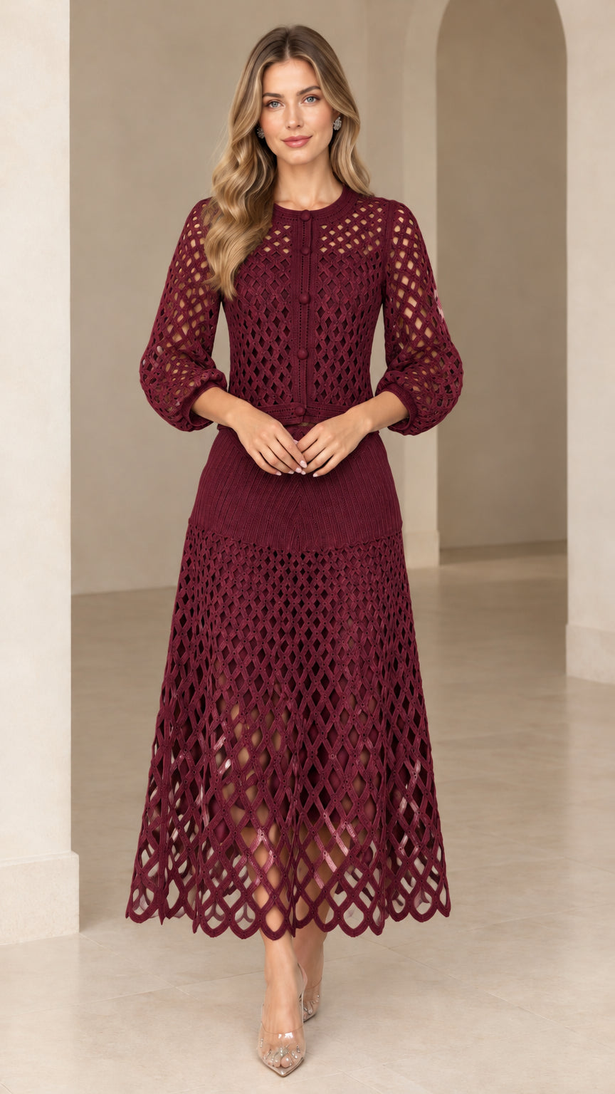 Model wearing burgundy red openwork knit two-piece occasion dress set