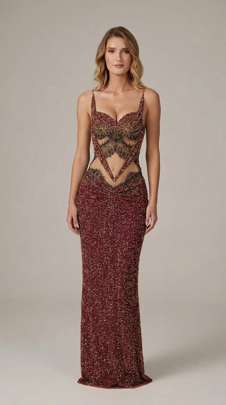 Model wearing burgundy wine red beaded floor-length dress with lace cutouts