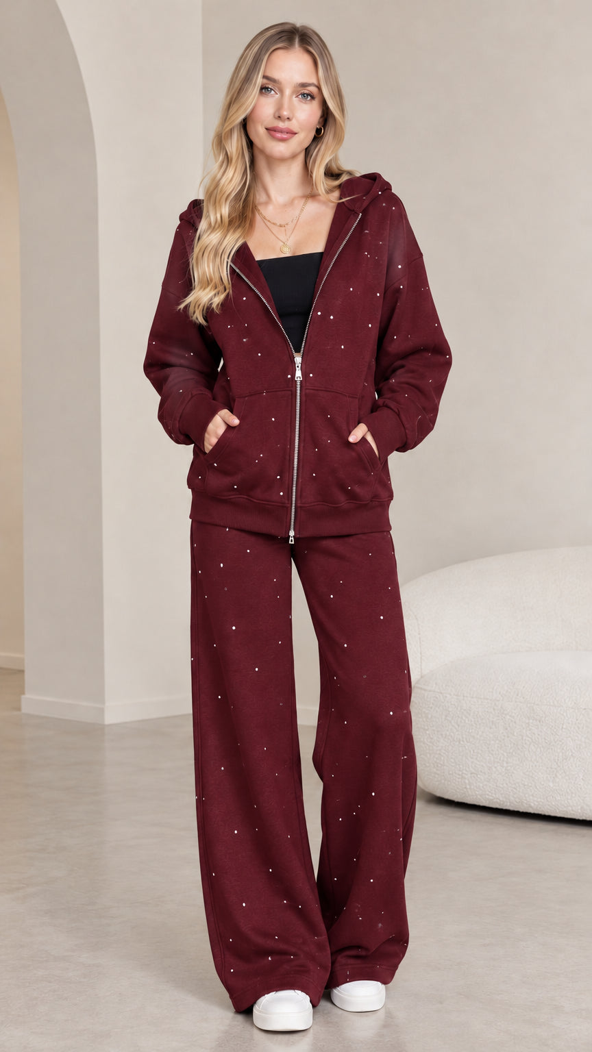 Full front view of model wearing burgundy wine red rhinestone zip hoodie and wide-leg sweatpants set