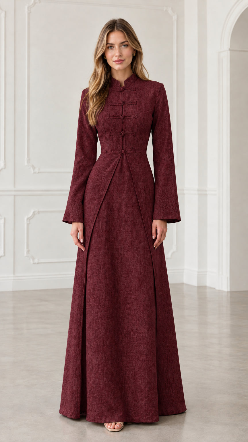 Front view of model wearing burgundy long sleeve frog button maxi dress