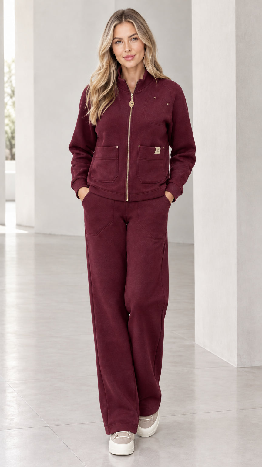 Model wearing burgundy wine fleece tracksuit set