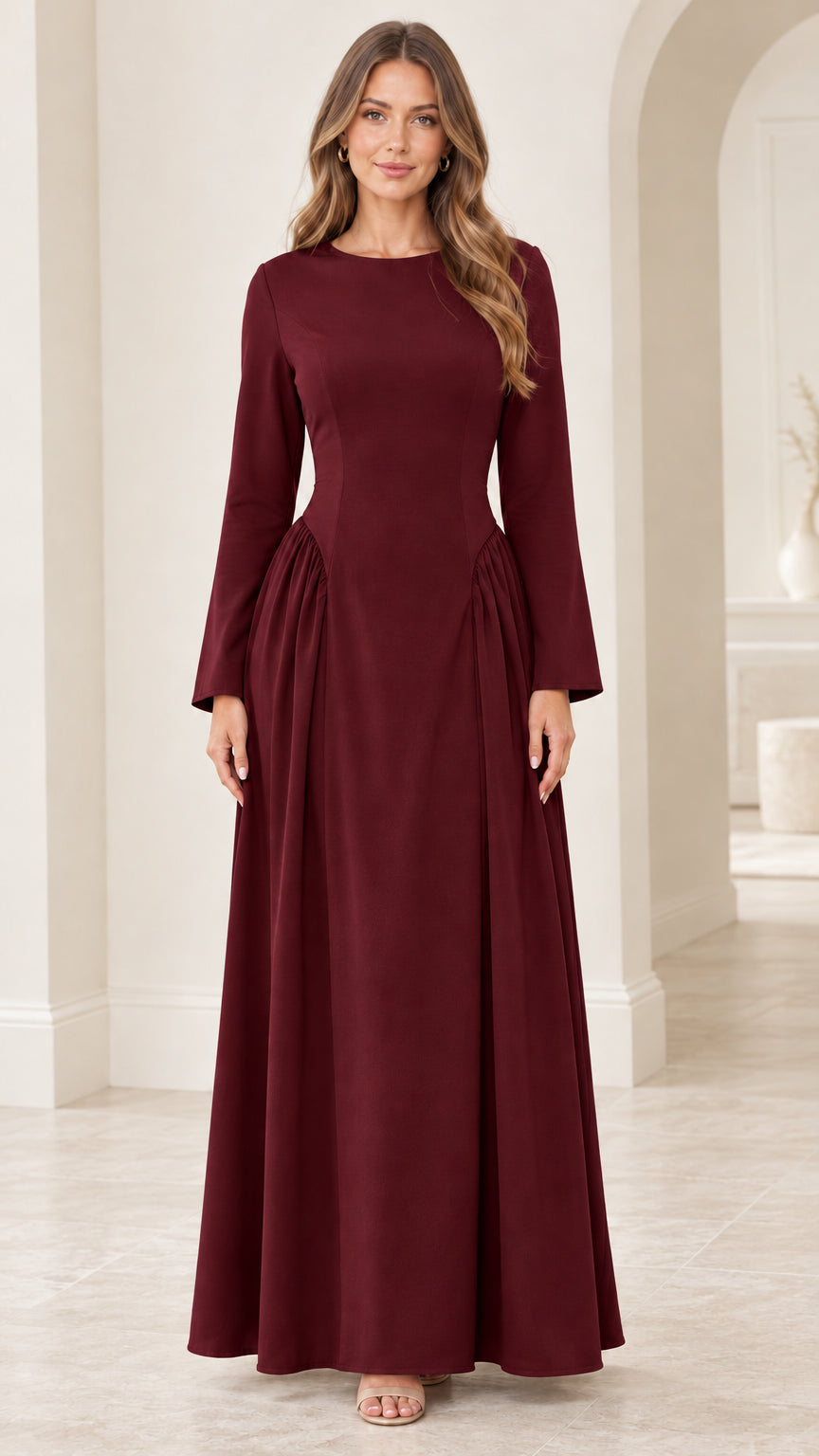 Front view of woman wearing burgundy wine red elegant maxi gown