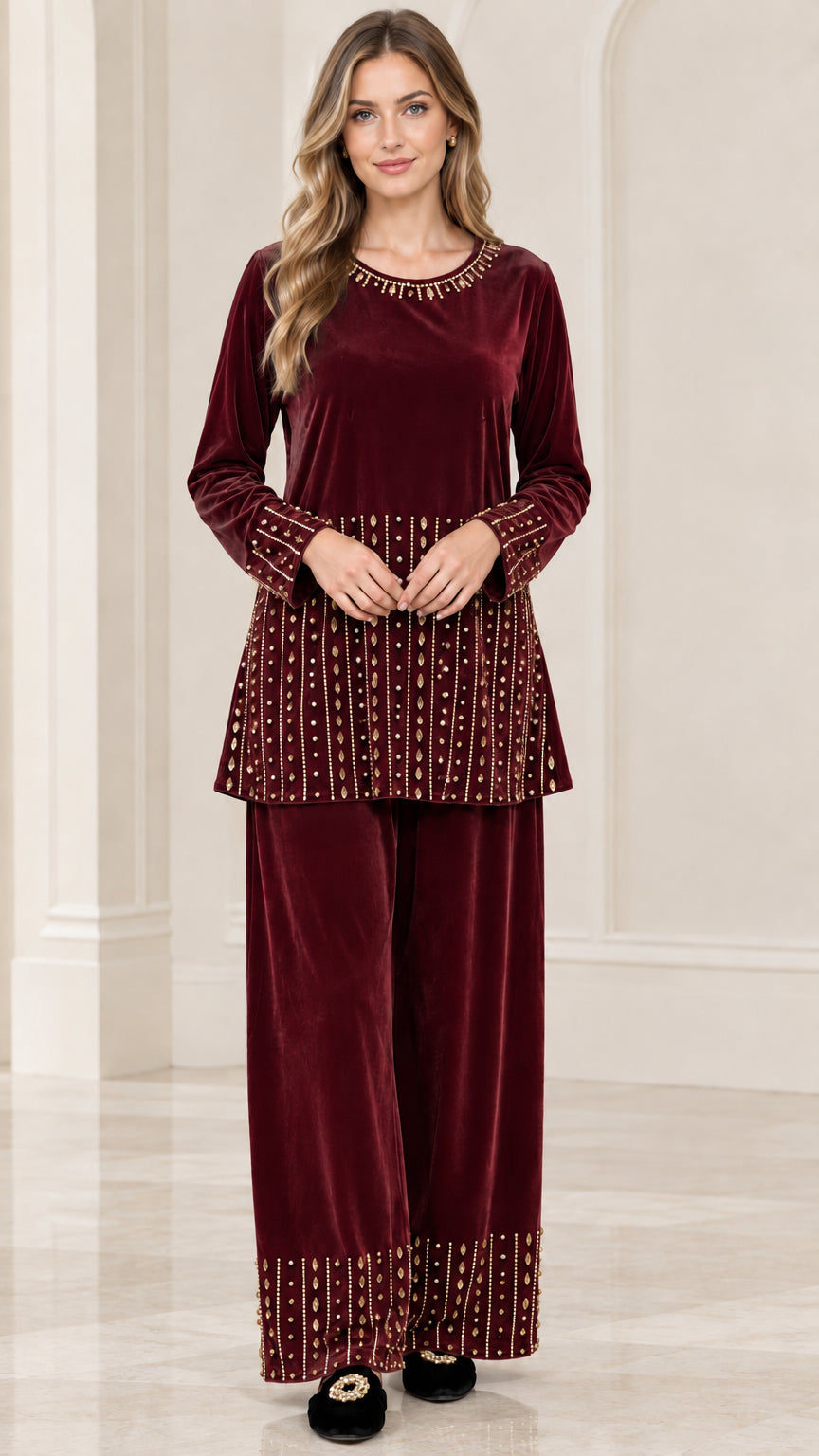 Front view of woman wearing burgundy red embellished velvet tunic and pants set