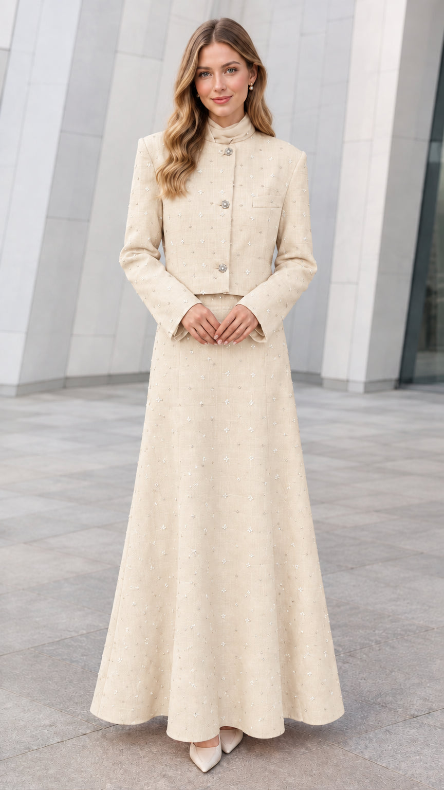 Front view of model wearing Cream embellished tweed cropped jacket and maxi skirt set