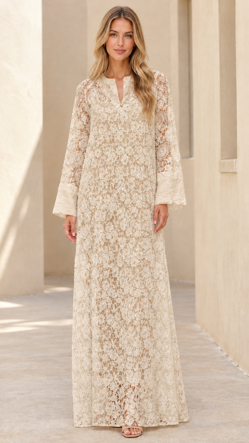 Woman wearing champagne beige floral lace long sleeve maxi dress