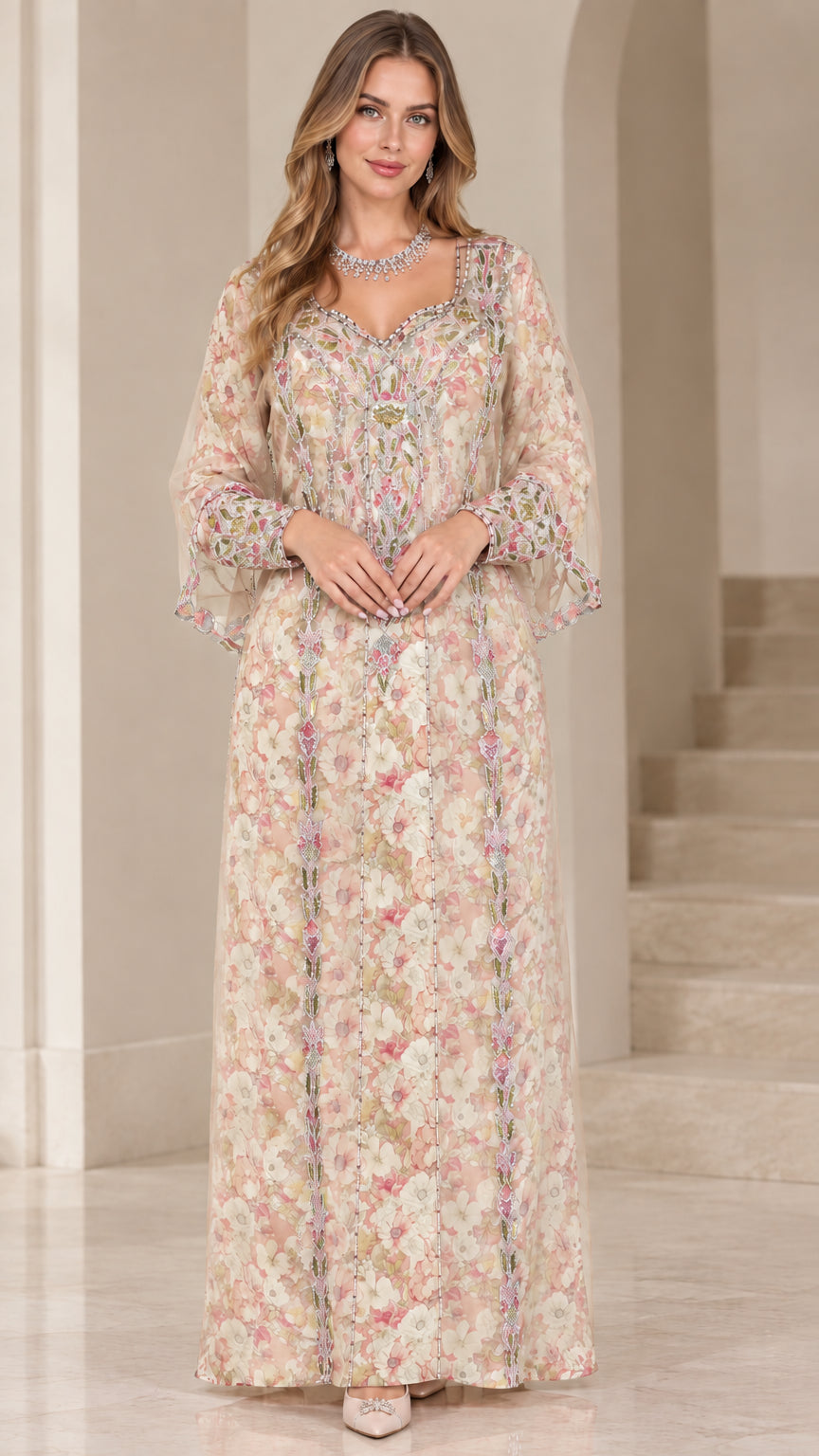Front view of woman wearing champagne floral embroidered kaftan maxi dress