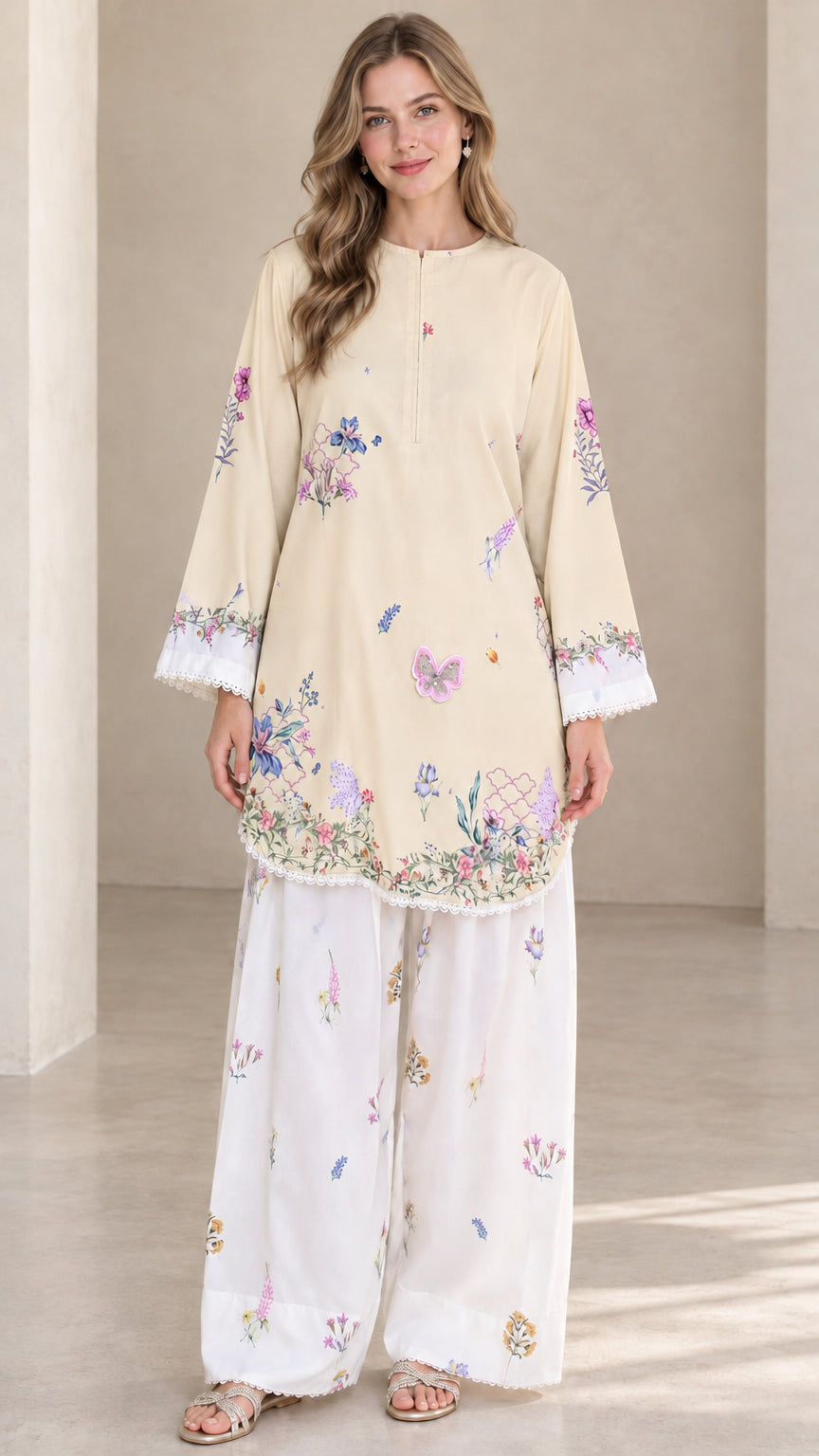 Front view of model wearing Beige floral tunic and white wide leg pants set