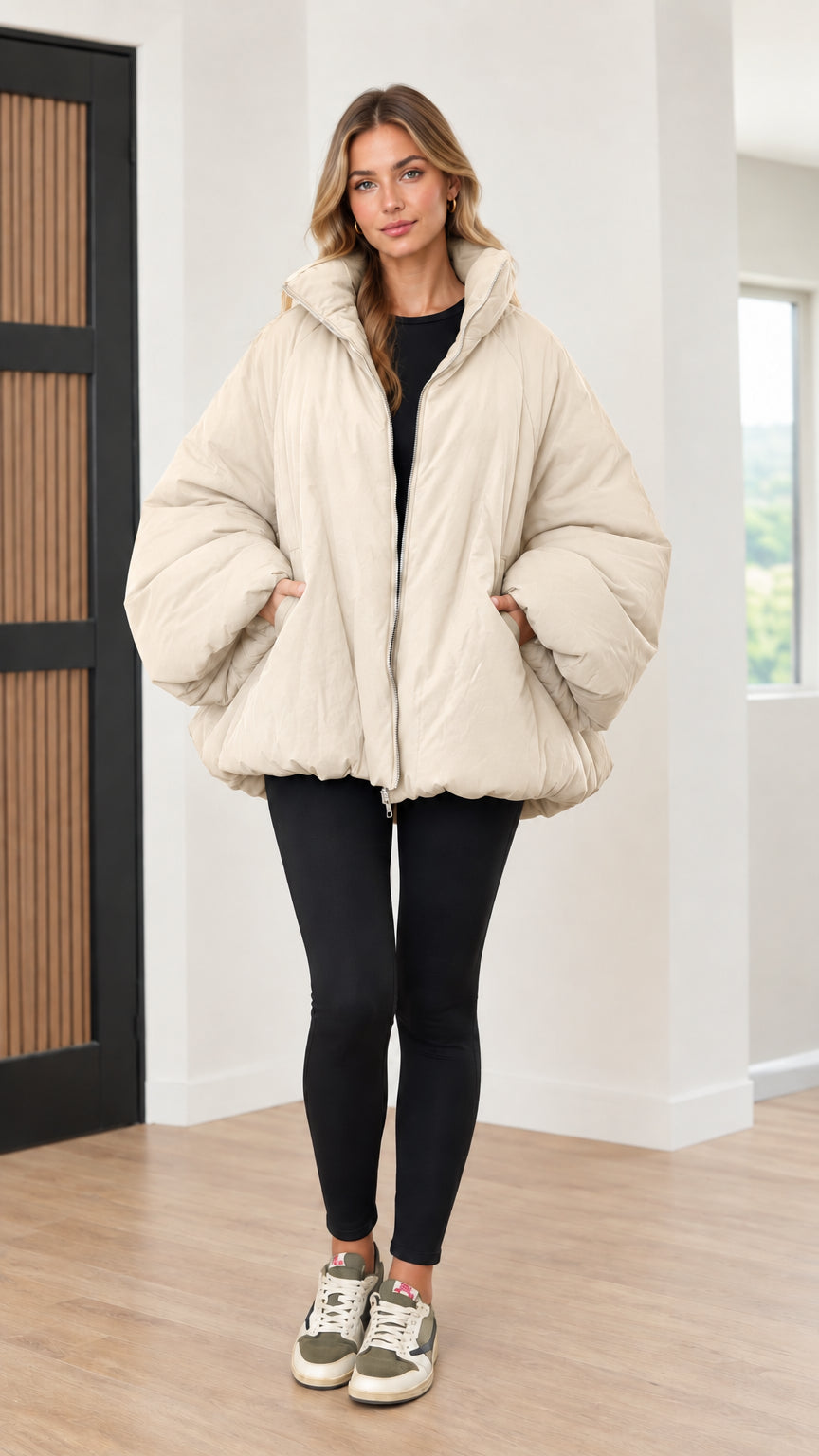 Model wearing cream off-white voluminous bubble puffer jacket