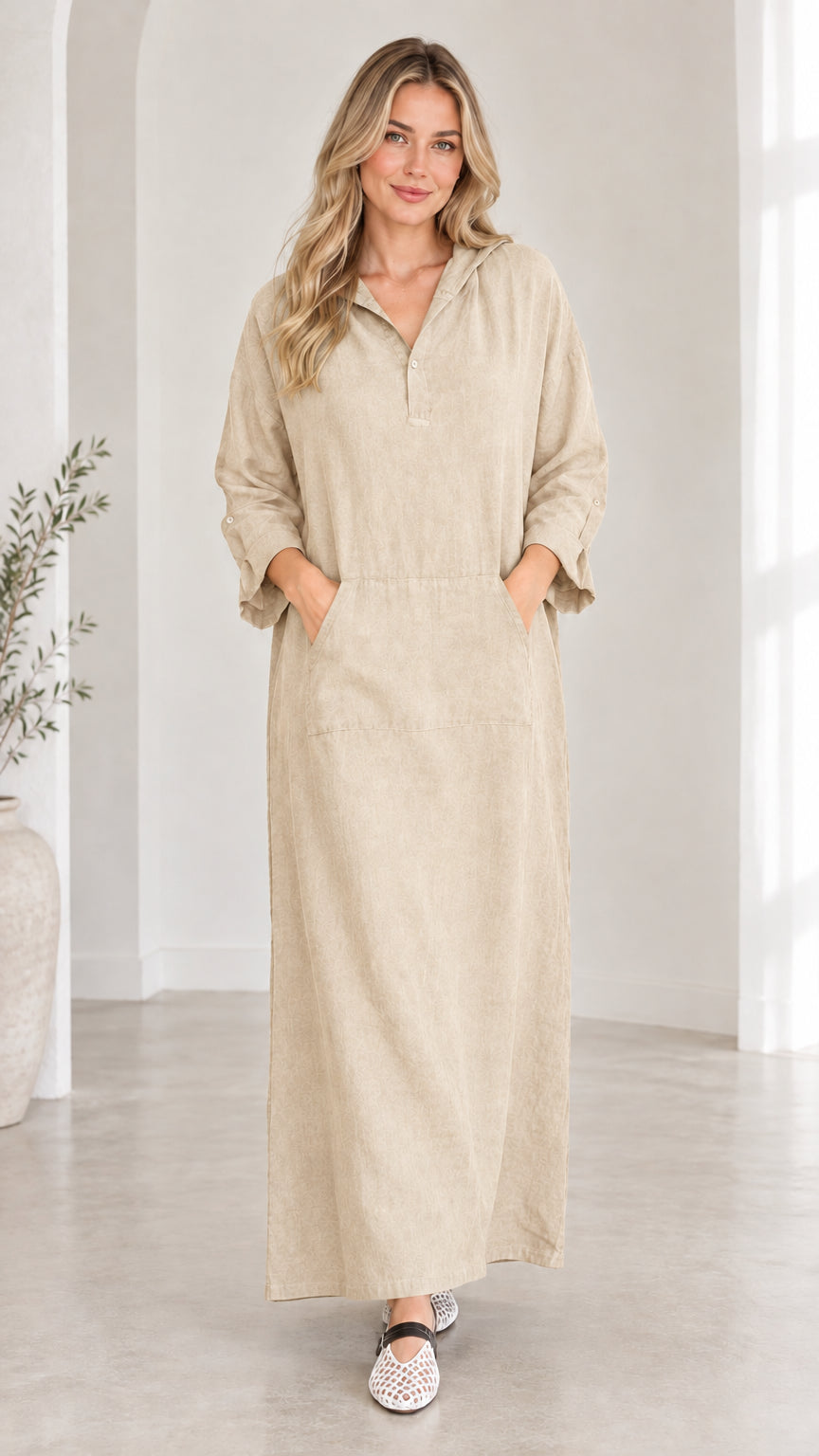 Front view of woman wearing natural beige hooded maxi dress